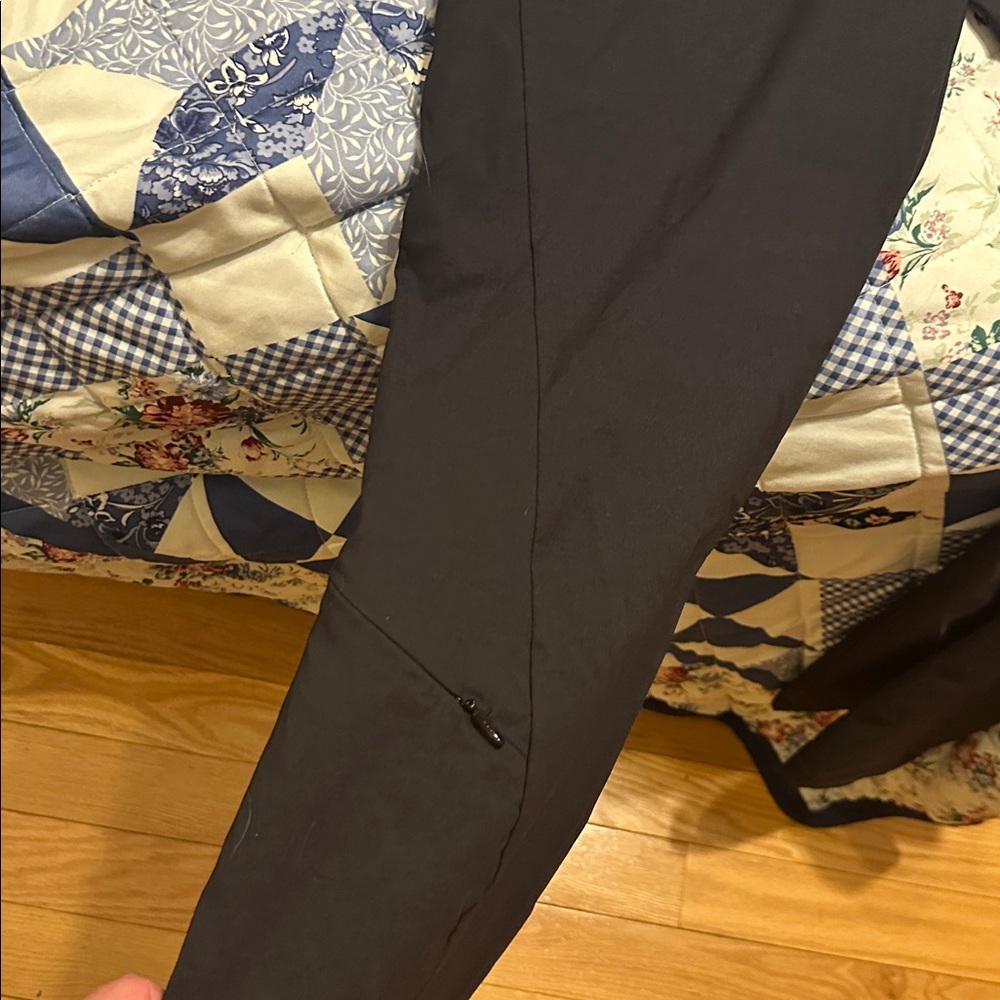 Athleta Charcoal flared Pants. Zippered pocket on lower leg. Side pockets - Picture 3 of 4